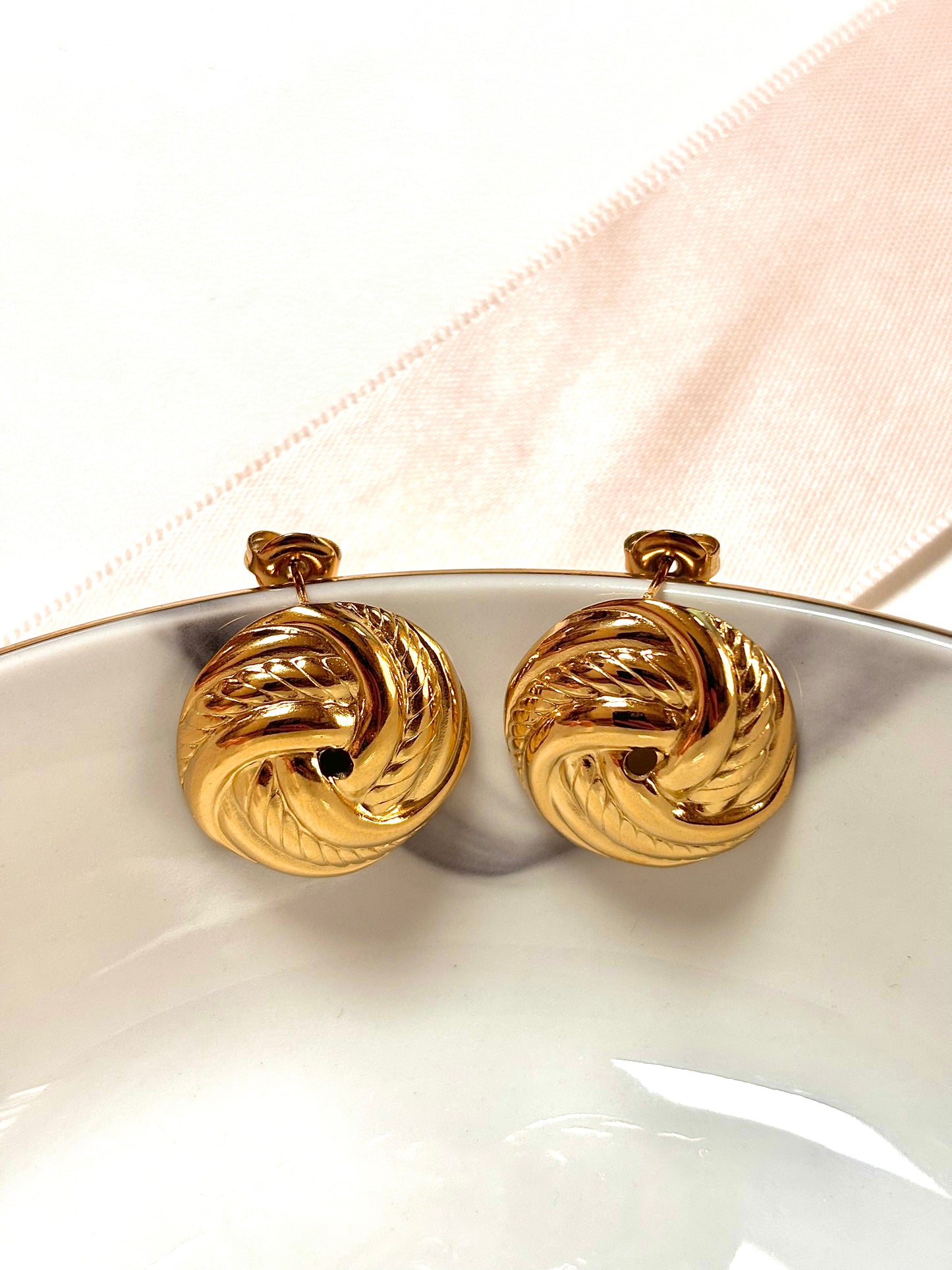 Boucles d’oreilles torsadées
