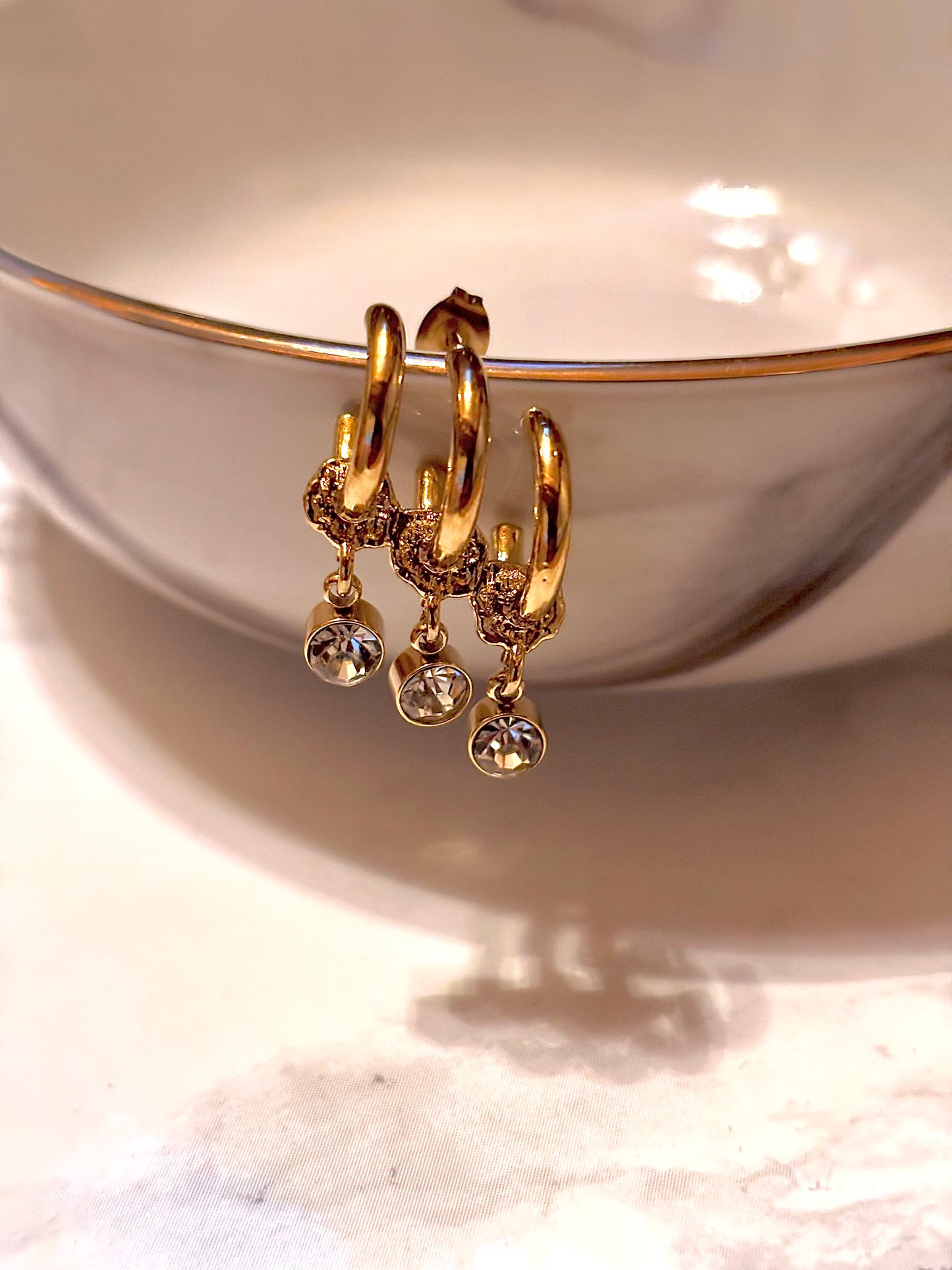 Boucles d’oreilles formées de trois mini-créoles