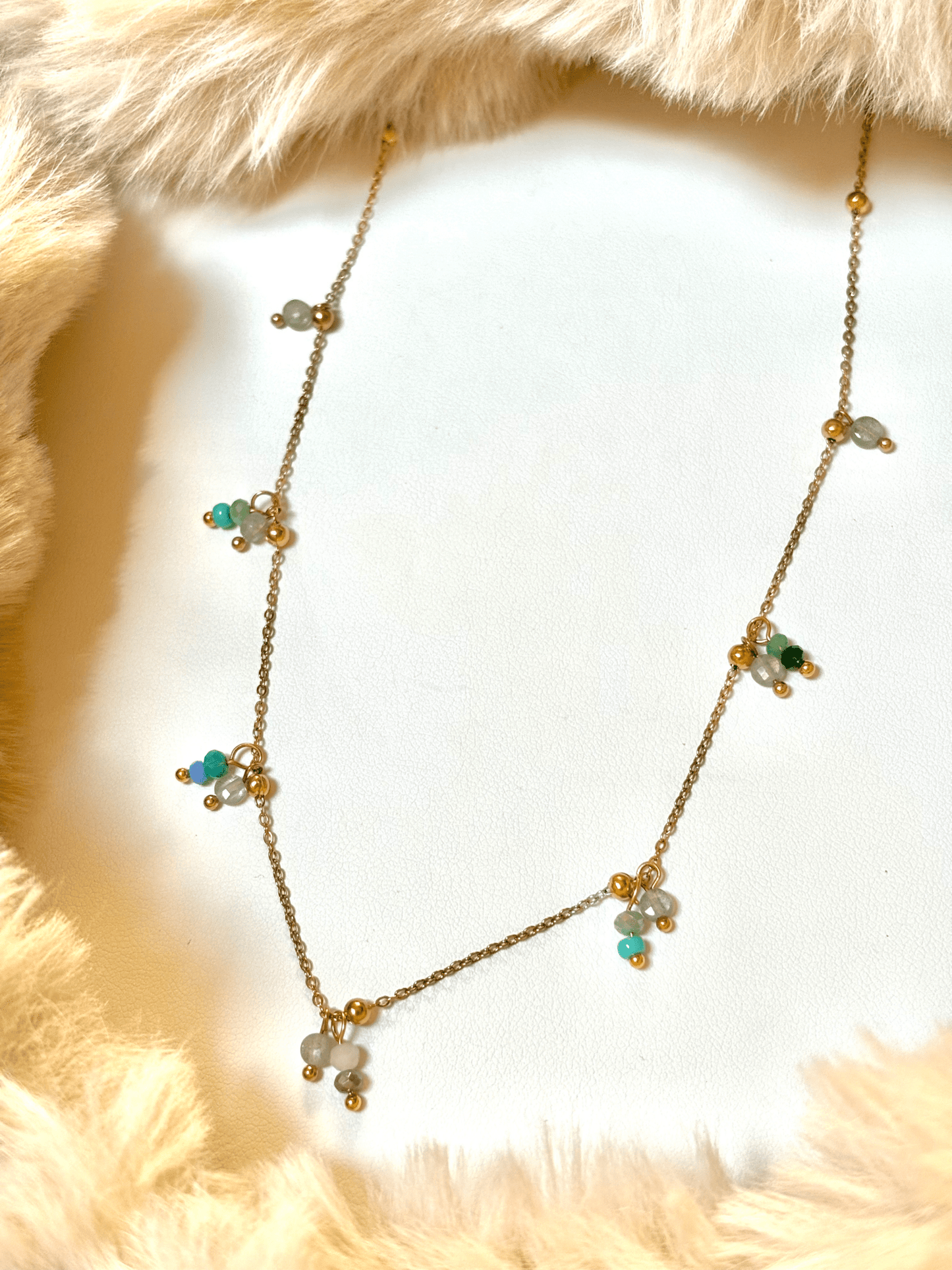 collier breloque emeraude