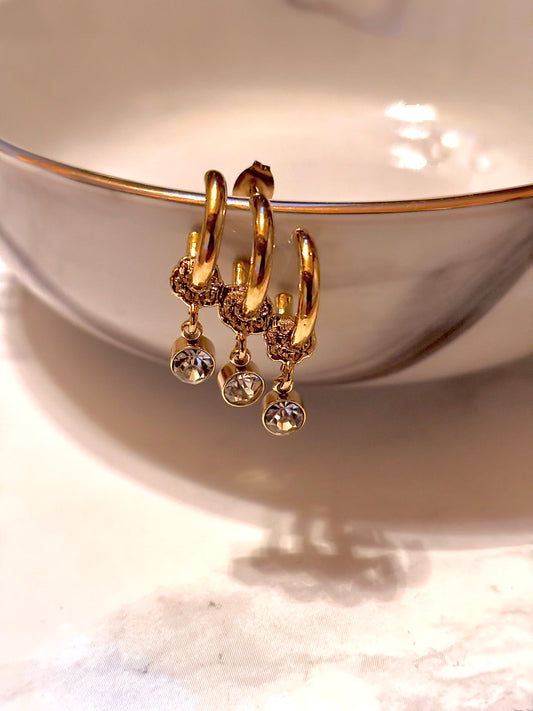 Boucles d’oreilles formées de trois mini-créoles
