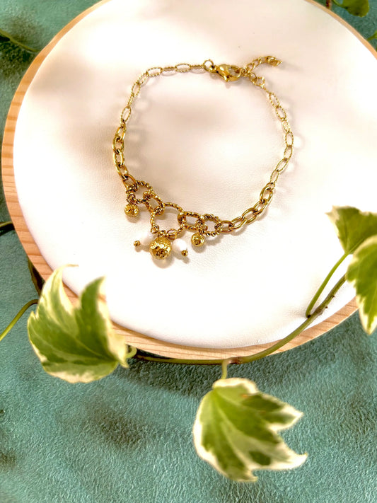 bracelet en acier inoxydable avec perles dorées et blanche