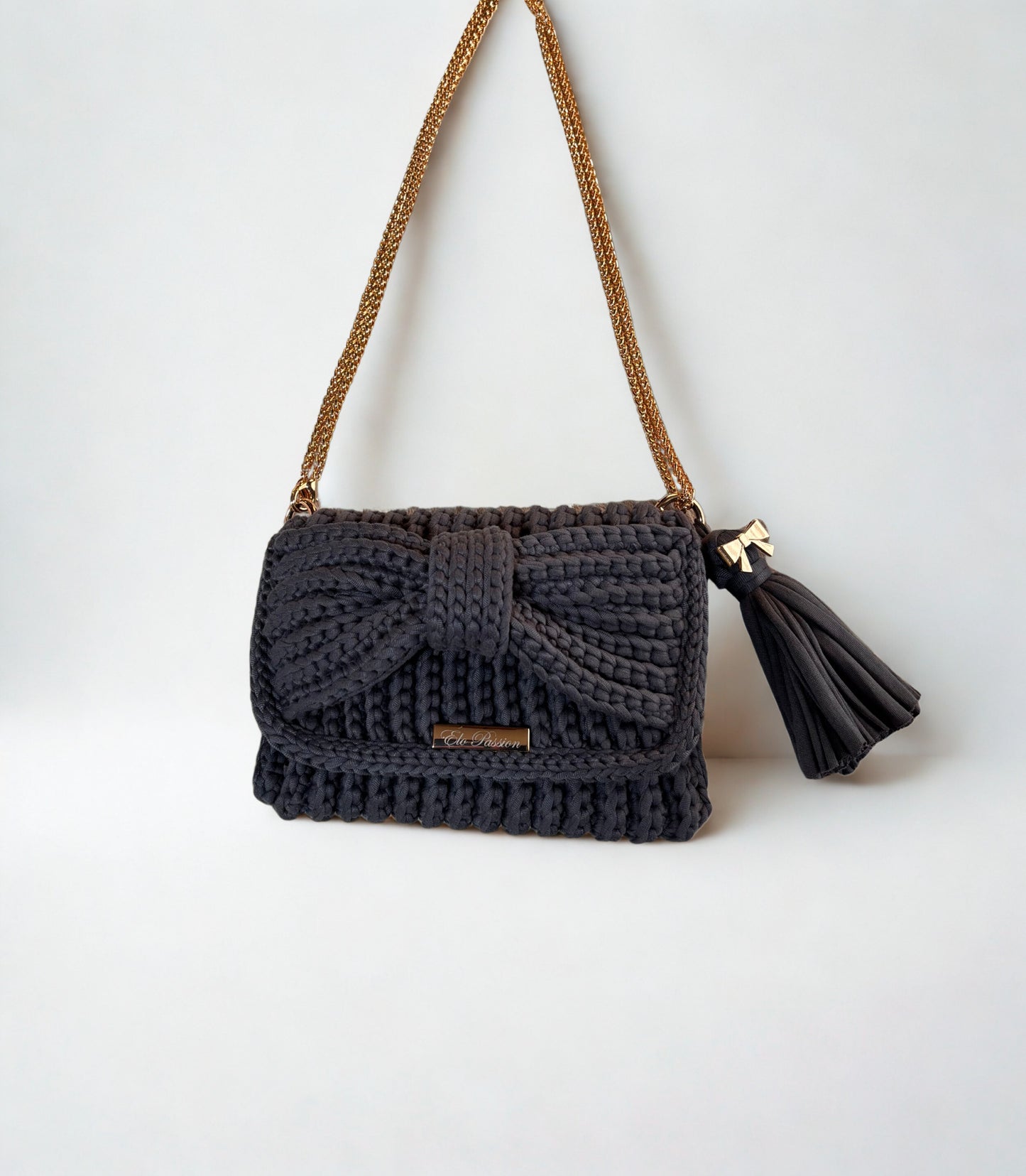 Pochette NOELIA - Mini Sac avec noeud papillon - Coloris GRIS